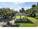 Outdoor gazebo featuring picnic tables and set within a grassy and treed common area at 1070 Moss Grove Dr, Moncks Corner, SC 29461