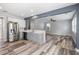 This kitchen boasts stainless steel appliances, a stylish breakfast bar, and a seamless connection to the living area at 1070 Moss Grove Dr, Moncks Corner, SC 29461