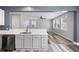 This kitchen features a spacious layout and modern appliances, seamlessly connecting to the adjacent living area at 1070 Moss Grove Dr, Moncks Corner, SC 29461