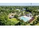 Pool area with adjacent playground and picnic tables, providing a recreational space for all ages at 1070 Moss Grove Dr, Moncks Corner, SC 29461