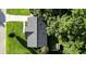 Aerial view of a house with a driveway and mature trees in a well-maintained lawn at 109 Ashdown Dr, Summerville, SC 29483