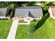 A beautiful home features a driveway, a well-manicured lawn, and lush landscaping at 109 Ashdown Dr, Summerville, SC 29483