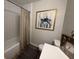Bathroom with a white tub and tiled wall plus decor, offering a refreshing and stylish space at 109 Ashdown Dr, Summerville, SC 29483