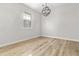 Cozy bedroom featuring light wood floors, recessed lighting, and a modern light fixture at 109 Ashdown Dr, Summerville, SC 29483
