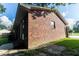 Exterior view of the brick home showcasing the corner of the house at 109 Ashdown Dr, Summerville, SC 29483