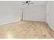 Bright, empty living room with light wood floors and a ceiling fan, ready for personalization at 109 Ashdown Dr, Summerville, SC 29483