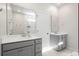 Well-lit bathroom features dual vanities, modern fixtures, and clean lines offers a functional and stylish space at 109 W Respite Ln, Summerville, SC 29483