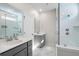 Bright bathroom with dual sinks, a glass-enclosed shower, and modern fixtures provides a spa-like experience at 109 W Respite Ln, Summerville, SC 29483