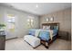 Cozy bedroom with a comfortable bed, soft carpet, and access to outdoor balcony provides a relaxing retreat at 109 W Respite Ln, Summerville, SC 29483