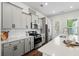 Modern kitchen featuring quartz countertops, stainless steel appliances, and ample cabinet space at 109 W Respite Ln, Summerville, SC 29483