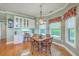 Breakfast nook with built-in cabinets, hardwood floors, and windows at 109 Waveney Cir, Goose Creek, SC 29445