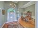 Elegant dining room with chandelier, arched doorways, and hardwood floors at 109 Waveney Cir, Goose Creek, SC 29445