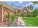 Inviting front entrance with landscaped walkway leading to a classic brick home at 109 Waveney Cir, Goose Creek, SC 29445