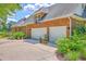 Spacious three-car garage with ample parking and well-maintained landscaping at 109 Waveney Cir, Goose Creek, SC 29445
