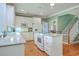 Well-lit kitchen with island and breakfast bar seating at 109 Waveney Cir, Goose Creek, SC 29445