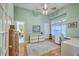 Bright office with built-in desk, hardwood floors, and large window at 109 Waveney Cir, Goose Creek, SC 29445