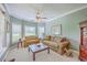 Cozy sitting room with comfortable sofas, ceiling fan, lots of natural light and a nice view at 109 Waveney Cir, Goose Creek, SC 29445