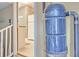Built-in VacuFlo central vacuum system unit with hose connection, near an doorway into a kitchen space at 109 Waveney Cir, Goose Creek, SC 29445