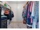 Organized walk-in closet offering ample storage with shelving, hanging rods, and a security safe at 1111 Sandy Springs Circle, Walterboro, SC 29488