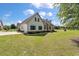 Charming two-story home with a well-manicured lawn and classic architectural details at 1111 Sandy Springs Circle, Walterboro, SC 29488