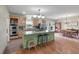 Open kitchen featuring a spacious island with seating, stainless steel appliances, and abundant cabinetry at 1111 Sandy Springs Circle, Walterboro, SC 29488