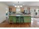 Well-appointed kitchen featuring a central island, stainless steel appliances, and ample counter space at 1111 Sandy Springs Circle, Walterboro, SC 29488