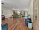 Open-concept living area flowing into a kitchen with hardwood floors and natural light at 1111 Sandy Springs Circle, Walterboro, SC 29488