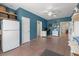 Spacious office featuring a white refrigerator, white walls, and an open work area at 1111 Sandy Springs Circle, Walterboro, SC 29488