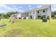 Spacious backyard perfect for outdoor activities with a swing set at 113 Cozy Nest Way, Summerville, SC 29483