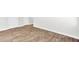 This empty bedroom offers wood floors and natural light at 113 Cozy Nest Way, Summerville, SC 29483