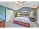 Bedroom with vaulted ceiling, neutral carpet, craftsman trim, and elegant decor at 115 Cooper Dr, Summerville, SC 29483