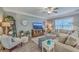 Comfortable living room with neutral furniture, a ceiling fan, and plenty of natural light at 115 Cooper Dr, Summerville, SC 29483