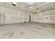 Unfinished two-car garage with drywall and lighting ready for your customizations at 1213 Locals St, Summerville, SC 29485