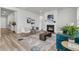 Elegant living room with a cozy fireplace and stylish furniture at 1213 Locals St, Summerville, SC 29485