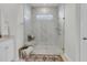 Luxurious glass-enclosed shower with elegant marble tiling at 1213 Locals St, Summerville, SC 29485