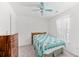 Comfortable bedroom with a ceiling fan, bright natural light, and a calming color scheme at 122 Stewart Pl, Summerville, SC 29485