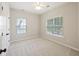 Empty bedroom with neutral tones, lots of natural light, carpet floors, and a double door closet at 1228 Walleye Cor, Charleston, SC 29414