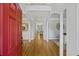 Elegant foyer with hardwood floors, white pillars, and a view into the living spaces showcasing the home's design at 1228 Walleye Cor, Charleston, SC 29414