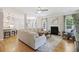 Spacious living room with hardwood floors, fireplace, and open view into kitchen at 1228 Walleye Cor, Charleston, SC 29414
