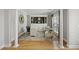 Home office with hardwood floors, built-in shelving, a stylish desk, and plenty of natural light for productivity at 1228 Walleye Cor, Charleston, SC 29414