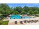 Community pool with lots of room to swim and plenty of chairs for residents to enjoy at 1228 Walleye Cor, Charleston, SC 29414