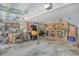Organized garage space with ample storage shelves, a bicycle, and tools at 125 Sumners Aly, Summerville, SC 29485