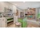 Spacious kitchen with stainless steel appliances and view into dining area at 125 Sumners Aly, Summerville, SC 29485