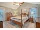 Spacious main bedroom features a four-poster bed and coordinated furnishings at 125 Sumners Aly, Summerville, SC 29485