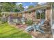 Charming patio with brick flooring and comfortable seating, ideal for outdoor relaxation at 125 Sumners Aly, Summerville, SC 29485
