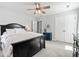 Spacious bedroom with a black bed frame, soft pink bedding, and natural light at 129 Saluda Dr, Moncks Corner, SC 29461