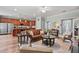 Open concept living room featuring hardwood floors, a large sofa, and natural light at 129 Saluda Dr, Moncks Corner, SC 29461