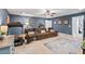 Comfortable living room with a large sectional couch, treadmill, and doorway to another room at 129 Saluda Dr, Moncks Corner, SC 29461