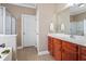 Well-lit main bathroom with a vanity, tile floors, and a separate shower at 129 Saluda Dr, Moncks Corner, SC 29461