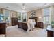 Spacious main bedroom with carpet, plenty of natural light, and a sitting area at 129 Saluda Dr, Moncks Corner, SC 29461